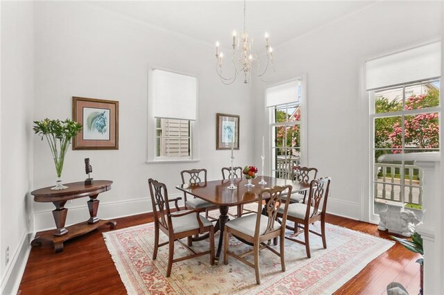 417 Eleonore St, New Orleans, LA 70115 - dining room with a chandelier and wood finished floors