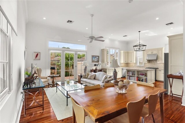 417 Eleonore St, New Orleans, LA 70115 - dining area with wood finished floors, ceiling fan, ornamental molding, and recessed lighting