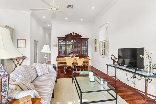 417 Eleonore St, New Orleans, LA 70115 - living room with wood finished floors, ceiling fan, crown molding, and recessed lighting