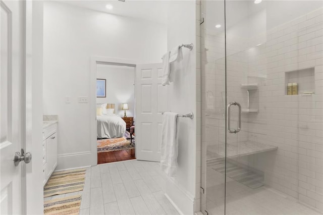 417 Eleonore St, New Orleans, LA 70115 - ensuite bathroom featuring a shower stall, vanity, and recessed lighting