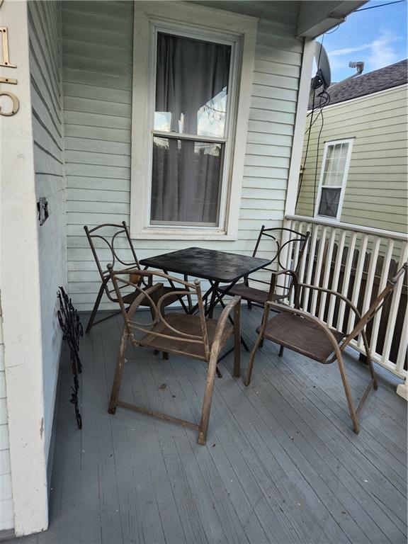 2715 Marengo St, New Orleans, LA 70115 - deck featuring outdoor dining space
