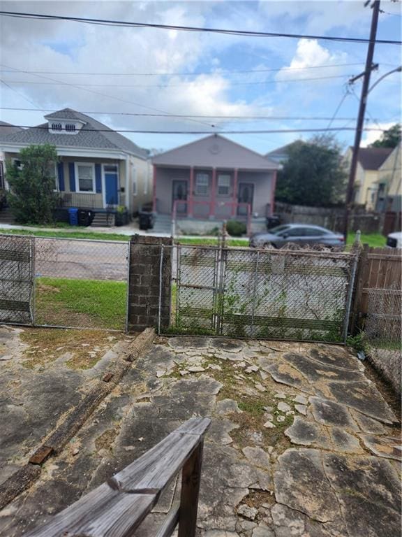 2715 Marengo St, New Orleans, LA 70115 - view of front of house featuring a gate and a fenced front yard