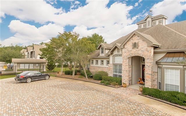 350 Emerald Forest Ave Unit 5202, Covington, LA 70433 - french country inspired facade featuring stone siding and a shingled roof