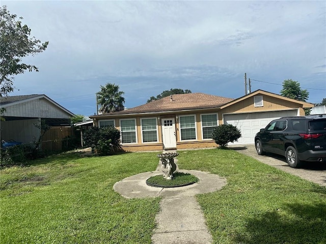 105 Beta St, Belle Chasse, LA 70037 - single story home with an attached garage and a front lawn