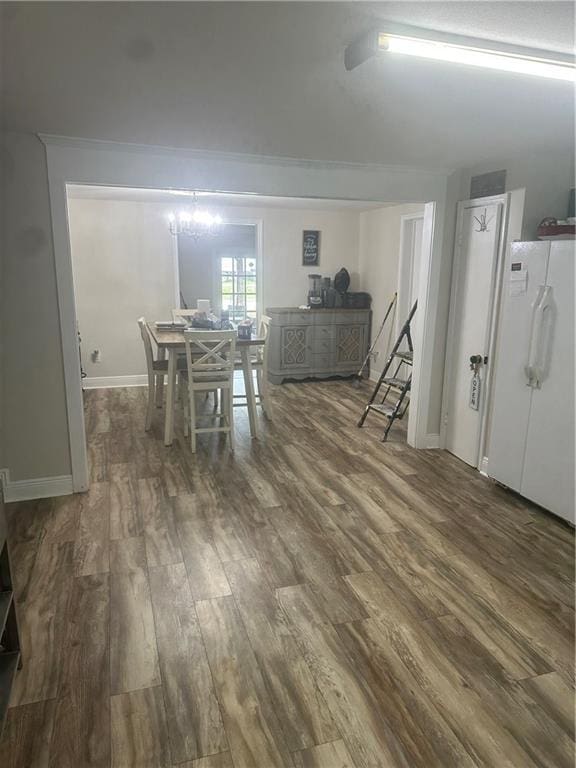 105 Beta St, Belle Chasse, LA 70037 - dining area with wood finished floors and baseboards