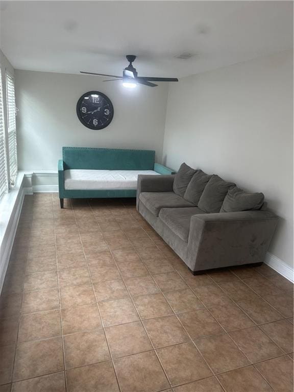 105 Beta St, Belle Chasse, LA 70037 - living room with tile patterned flooring and ceiling fan