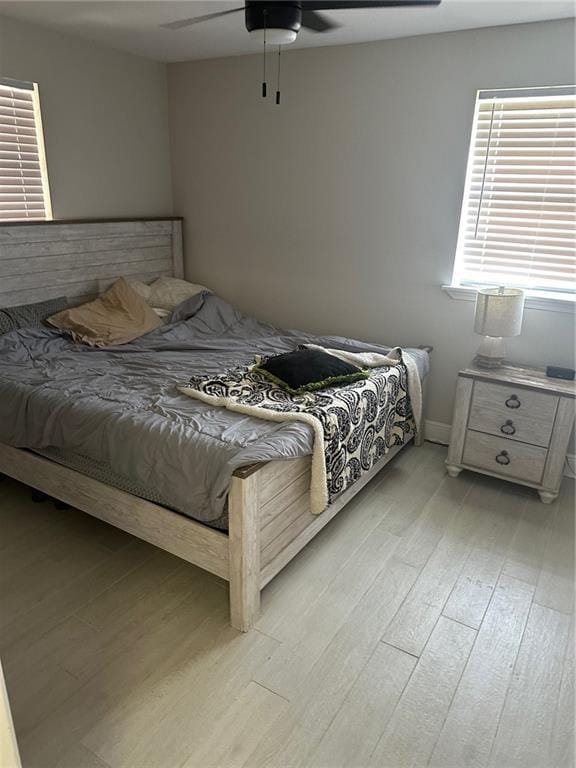 105 Beta St, Belle Chasse, LA 70037 - bedroom featuring light wood-style flooring and ceiling fan