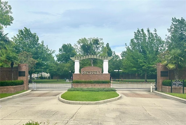 246 S Orchard Ln, Covington, LA 70433 - community sign with a gate