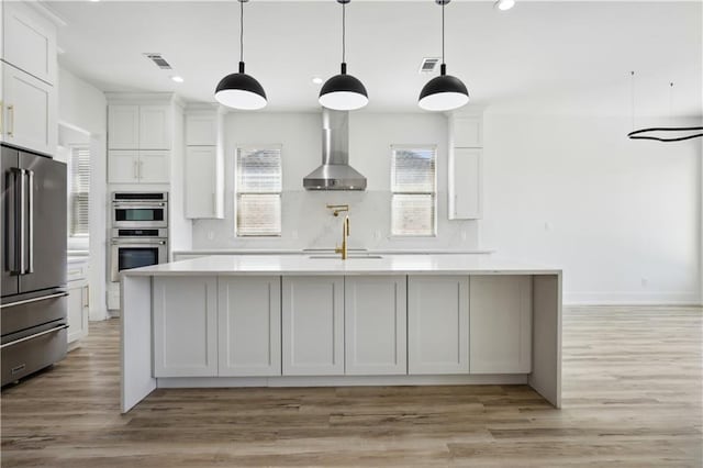 59 Oak Tree Dr, Slidell, LA 70458 - kitchen featuring appliances with stainless steel finishes, light countertops, recessed lighting, tasteful backsplash, and white cabinetry