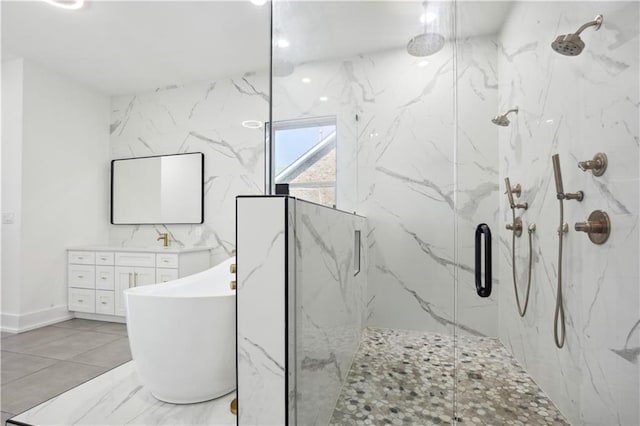 59 Oak Tree Dr, Slidell, LA 70458 - bathroom with a marble finish shower, vanity, and a soaking tub