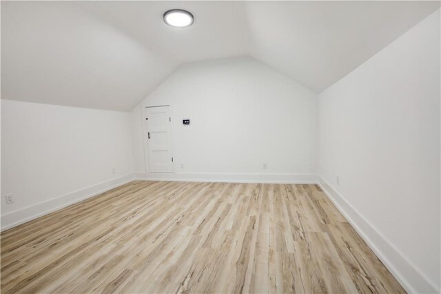 59 Oak Tree Dr, Slidell, LA 70458 - additional living space featuring light wood finished floors and vaulted ceiling
