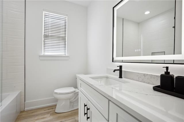 59 Oak Tree Dr, Slidell, LA 70458 - full bath featuring vanity, wood finished floors, and  shower combination