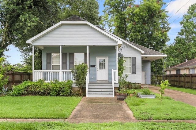2424 Lavender St, New Orleans, LA 70122 - bungalow-style home featuring a porch