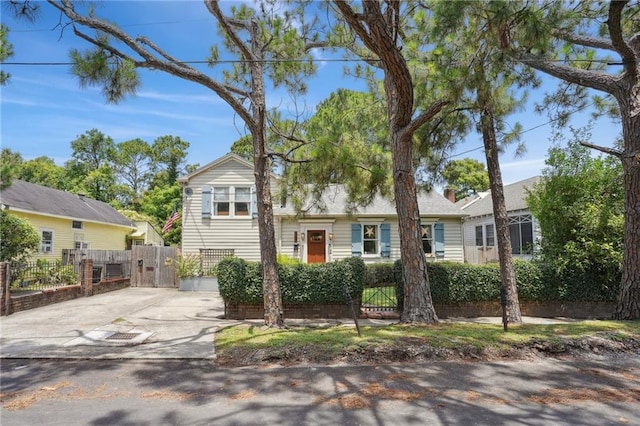 223840 Dante St, New Orleans, LA 70118 - view of front of property with concrete driveway and a gate