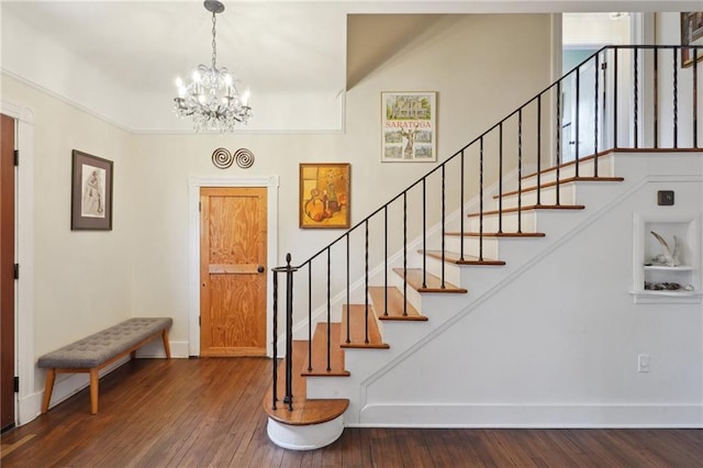 223840 Dante St, New Orleans, LA 70118 - entrance foyer with stairway, hardwood / wood-style floors, and a chandelier