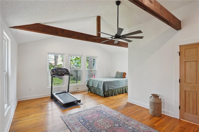 223840 Dante St, New Orleans, LA 70118 - bedroom featuring wood finished floors, a textured ceiling, and ceiling fan