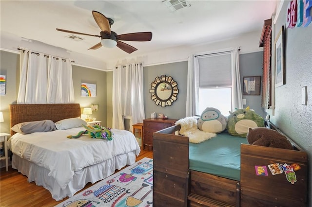 223840 Dante St, New Orleans, LA 70118 - bedroom featuring wood finished floors and a ceiling fan