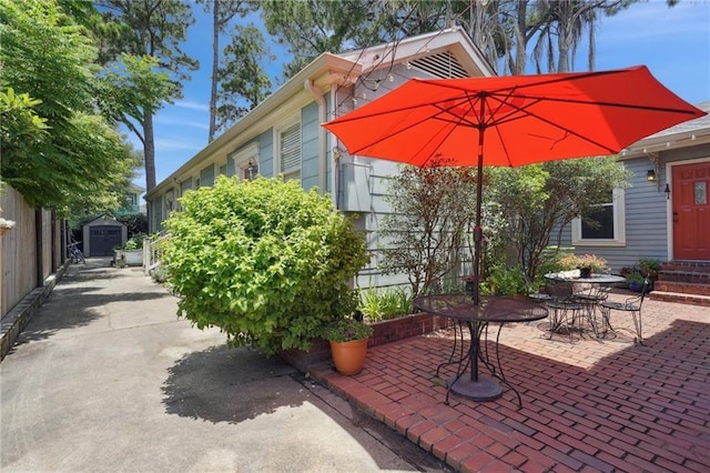 223840 Dante St, New Orleans, LA 70118 - view of patio / terrace featuring a storage unit and entry steps