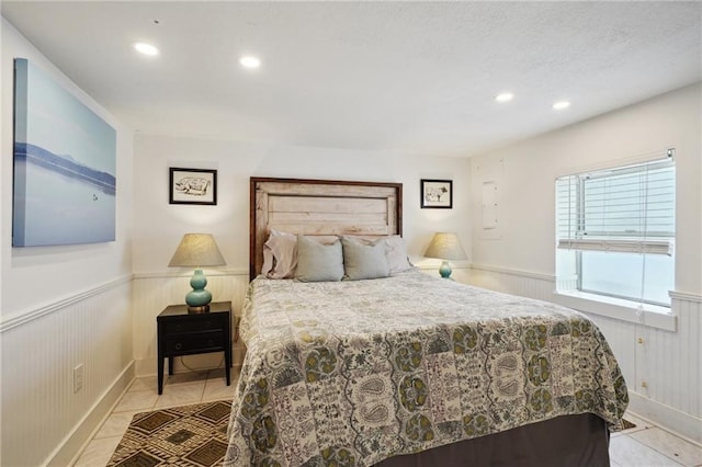 223840 Dante St, New Orleans, LA 70118 - tiled bedroom featuring wainscoting, recessed lighting, and a textured ceiling