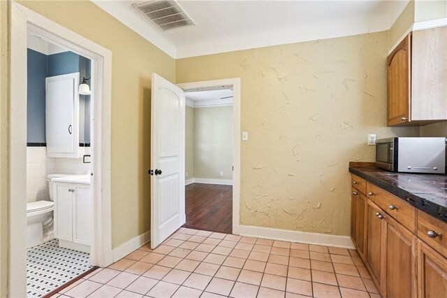 223840 Dante St, New Orleans, LA 70118 - spare room featuring wood-type flooring, crown molding, and ceiling fan