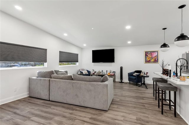 6709 Hastings St, Metairie, LA 70003 - living area with light wood-style flooring, recessed lighting, and lofted ceiling