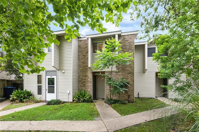 181 Sandra Del Mar Dr Unit 181, Mandeville, LA 70448 - townhome / multi-family property featuring brick siding