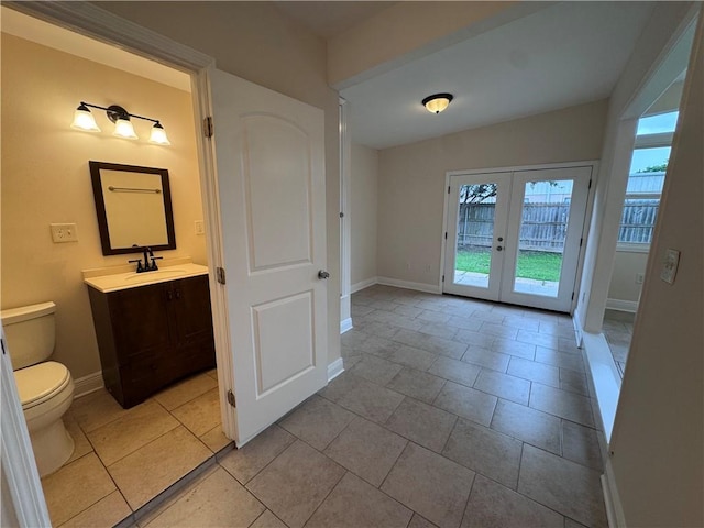 6 Brentwood Dr, Metairie, LA 70003 - entryway featuring plenty of natural light, french doors, and light tile patterned flooring