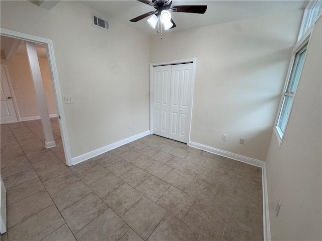 6 Brentwood Dr, Metairie, LA 70003 - tiled spare room with ceiling fan and baseboards
