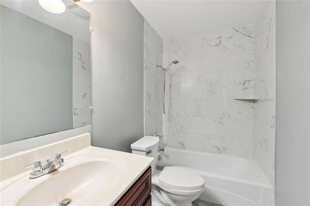 6200 Riverside Dr Unit 625, Metairie, LA 70003 - bathroom featuring vanity, shower / washtub combination, and a textured wall
