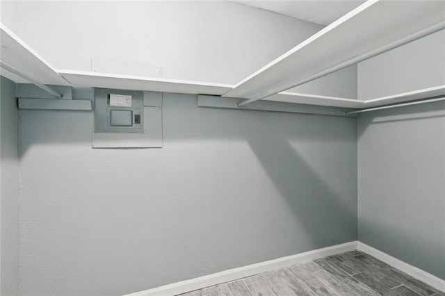 6200 Riverside Dr Unit 625, Metairie, LA 70003 - walk in closet with electric panel and wood finished floors