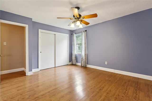 761 Holyoke Pl, Terrytown, LA 70056 - unfurnished bedroom featuring a closet, wood finished floors, and a ceiling fan