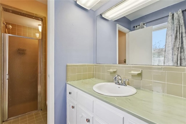 761 Holyoke Pl, Terrytown, LA 70056 - bathroom with backsplash, vanity, and a shower stall