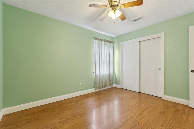 761 Holyoke Pl, Terrytown, LA 70056 - unfurnished bedroom featuring wood finished floors, a closet, and ceiling fan
