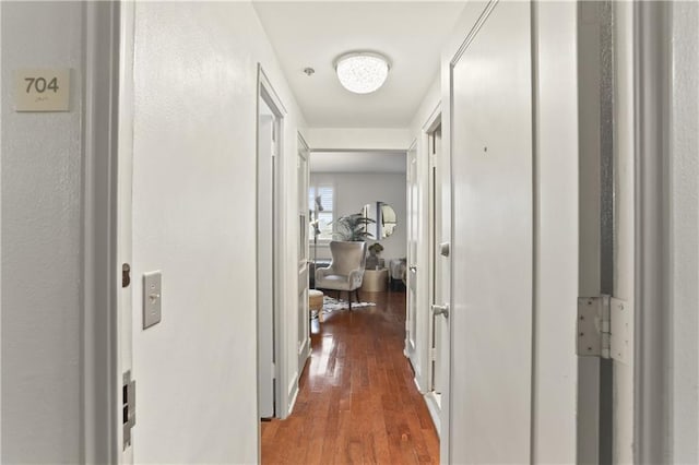 1205 St Charles Ave Unit 704, New Orleans, LA 70130 - corridor featuring wood finished floors