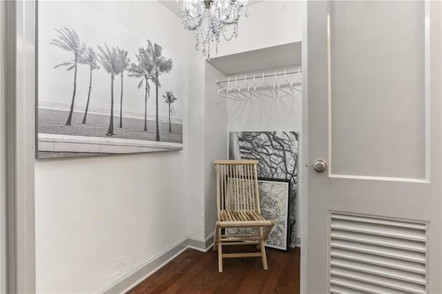 1205 St Charles Ave Unit 704, New Orleans, LA 70130 - spacious closet with a chandelier and wood finished floors