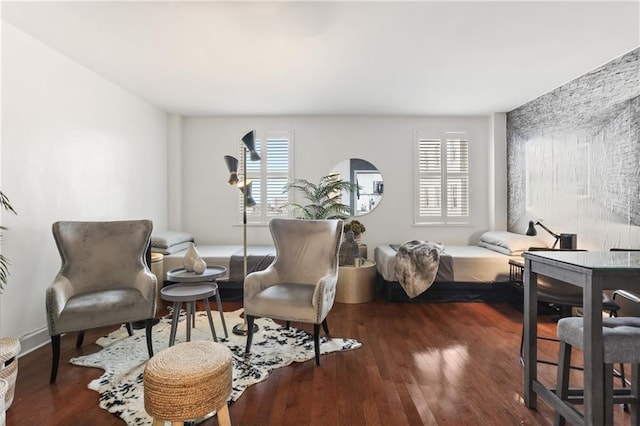 1205 St Charles Ave Unit 704, New Orleans, LA 70130 - bedroom featuring multiple windows and wood finished floors