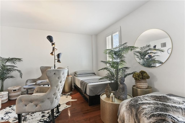 1205 St Charles Ave Unit 704, New Orleans, LA 70130 - bedroom featuring wood finished floors