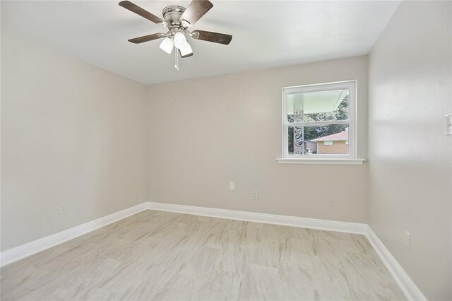 14 Derbes Dr, Gretna, LA 70053 - unfurnished room with baseboards and a ceiling fan