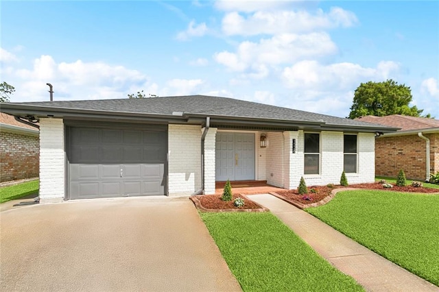 1528 N Cumberland St, Metairie, LA 70003 - single story home featuring driveway, brick siding, an attached garage, a front yard, and roof with shingles