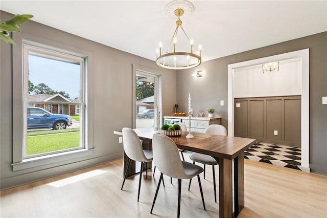 1528 N Cumberland St, Metairie, LA 70003 - dining area with a chandelier and light floors
