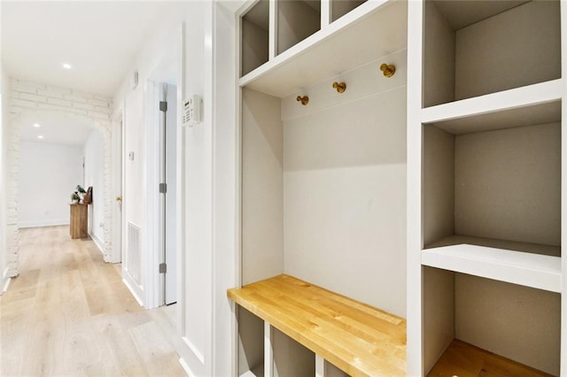 1528 N Cumberland St, Metairie, LA 70003 - mudroom with wood finished floors and arched walkways