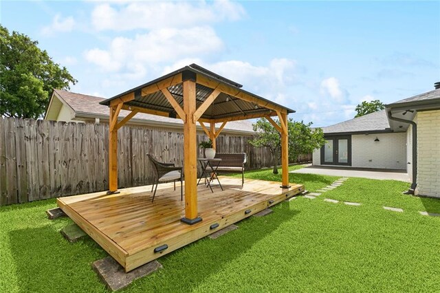 1528 N Cumberland St, Metairie, LA 70003 - fenced backyard featuring a gazebo, french doors, and a deck