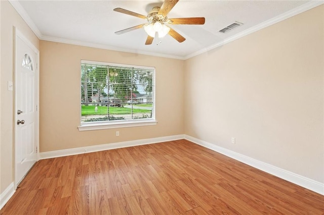 4700 Jasper St, Metairie, LA 70006 - spare room with light wood-style flooring, crown molding, and a ceiling fan