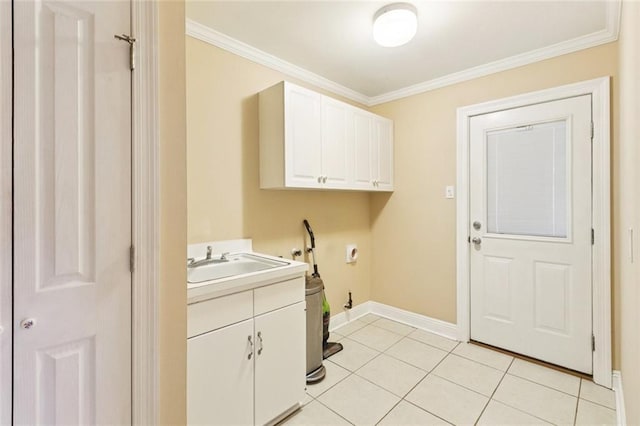 4700 Jasper St, Metairie, LA 70006 - laundry area with cabinet space, crown molding, light tile patterned floors, and hookup for a washing machine