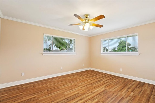 4700 Jasper St, Metairie, LA 70006 - empty room featuring healthy amount of natural light, light wood-style flooring, ornamental molding, and ceiling fan