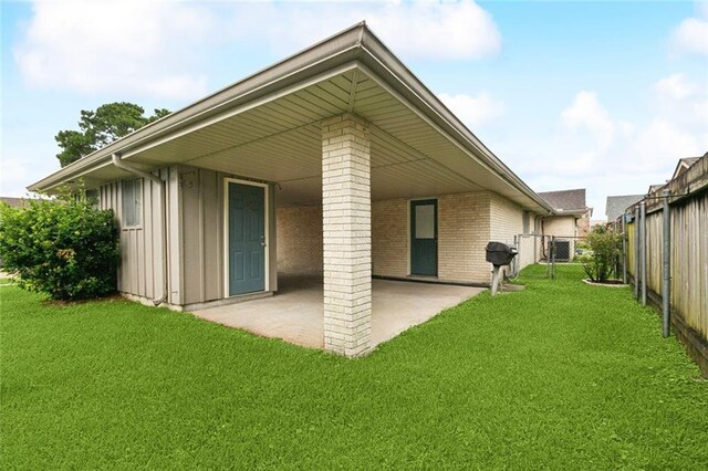 4700 Jasper St, Metairie, LA 70006 - back of house featuring a patio and brick siding