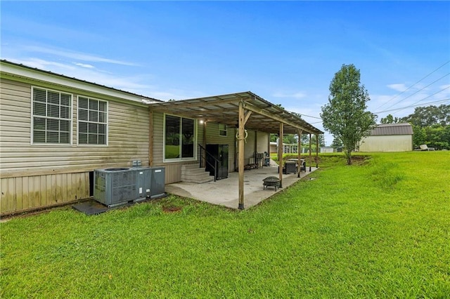 24483 Riley Rd, Pride, LA 70770 - back of property with a patio area, entry steps, a yard, and a pergola