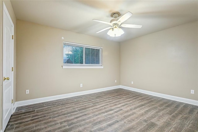 1410 Pecan St, Hammond, LA 70401 - empty room featuring dark wood-style flooring and a ceiling fan