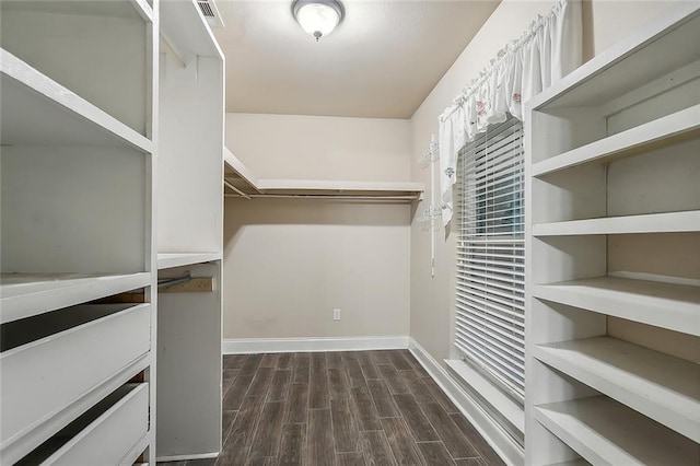 1410 Pecan St, Hammond, LA 70401 - walk in closet featuring dark wood-type flooring