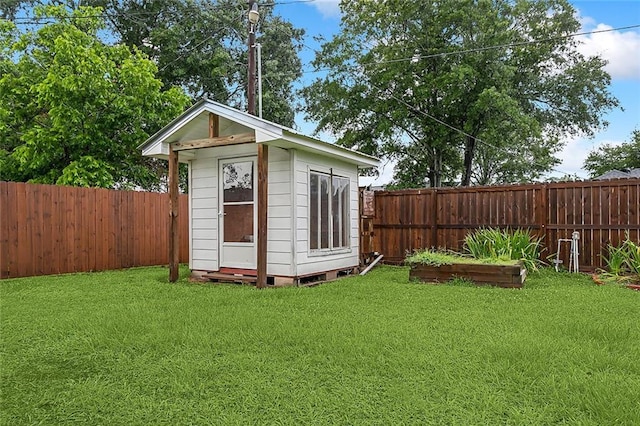 1410 Pecan St, Hammond, LA 70401 - view of shed with a fenced backyard
